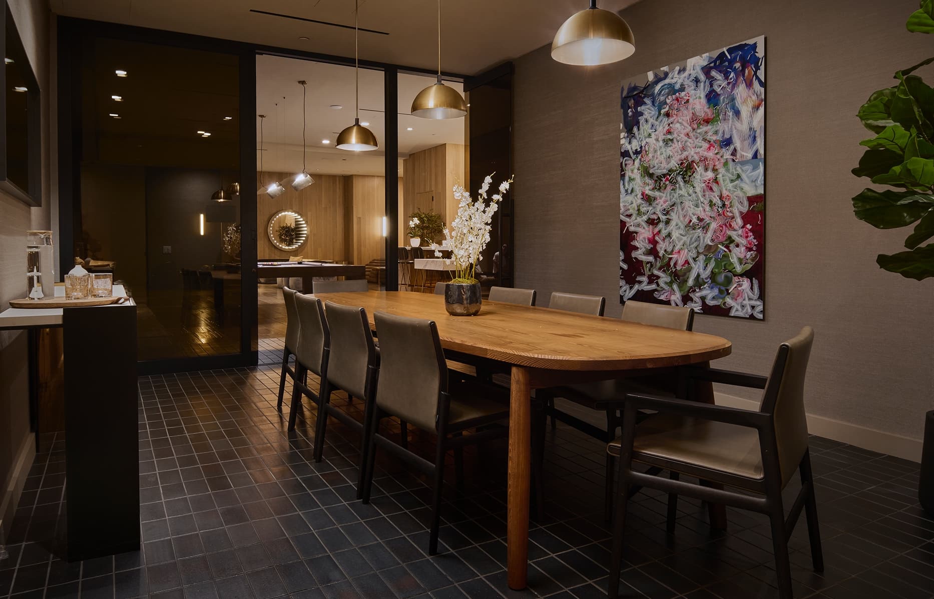 Private dining room at The Harland with long table, upholstered seating, and modern finishes for hosted gatherings.